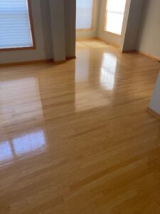 Light brown hardwood floors in pristine condition